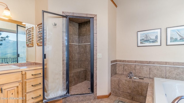 75 Windy Ln, Moyie Springs, ID 83845 - bathroom featuring vanity, a stall shower, a bath, and tile patterned floors