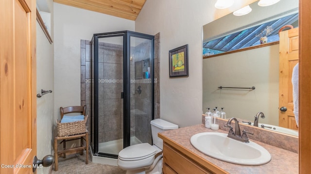 75 Windy Ln, Moyie Springs, ID 83845 - full bath with toilet, a stall shower, vanity, and tile patterned flooring
