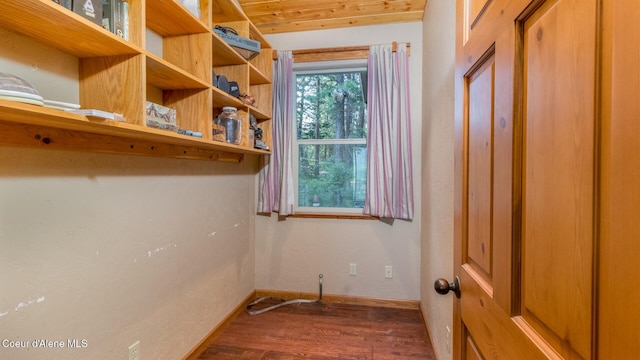 75 Windy Ln, Moyie Springs, ID 83845 - laundry area featuring wood finished floors and baseboards