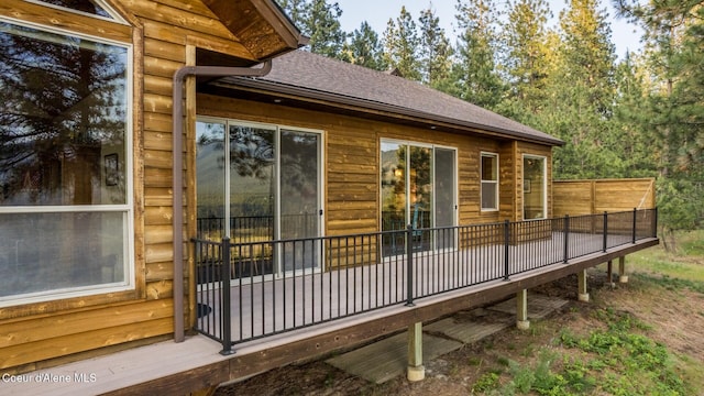 75 Windy Ln, Moyie Springs, ID 83845 - view of side of home with roof with shingles and a deck