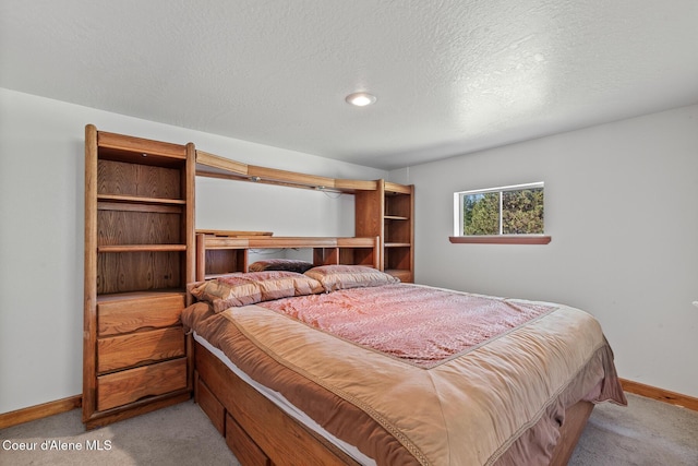 26277 N Chevrolane Way, Rathdrum, ID 83858 - bedroom featuring carpet flooring and a textured ceiling