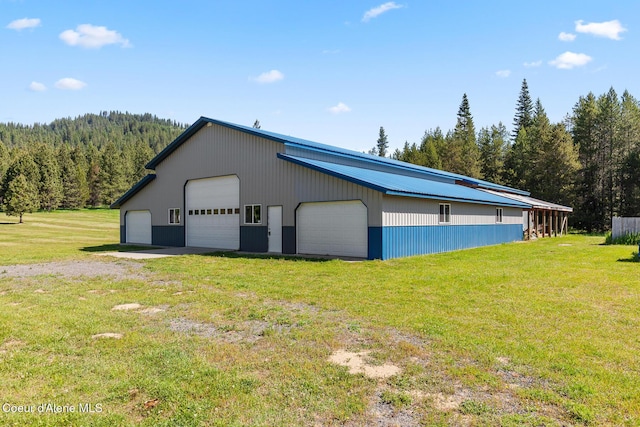 26277 N Chevrolane Way, Rathdrum, ID 83858 - detached garage with a forest view