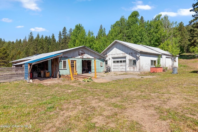 26277 N Chevrolane Way, Rathdrum, ID 83858 - view of outdoor structure with a forest view