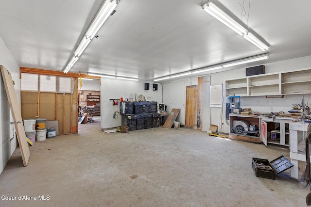 26277 N Chevrolane Way, Rathdrum, ID 83858 - garage with a workshop area