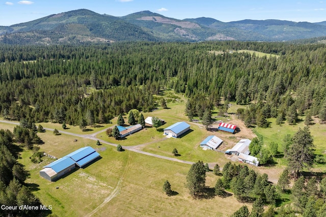 26277 N Chevrolane Way, Rathdrum, ID 83858 - bird's eye view of a heavily wooded area and a mountainous background