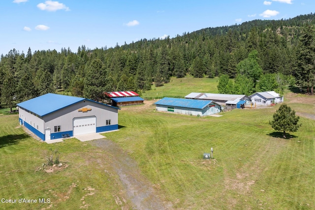 26277 N Chevrolane Way, Rathdrum, ID 83858 - aerial view of property and surrounding area featuring a forest