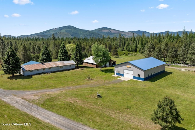 26277 N Chevrolane Way, Rathdrum, ID 83858 - view from above of property featuring mountains and a heavily wooded area