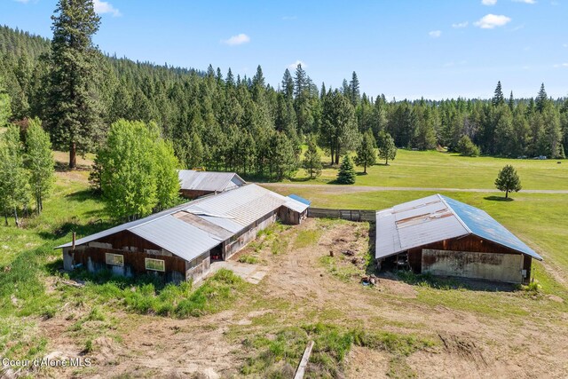 26277 N Chevrolane Way, Rathdrum, ID 83858 - aerial view of property and surrounding area with a heavily wooded area