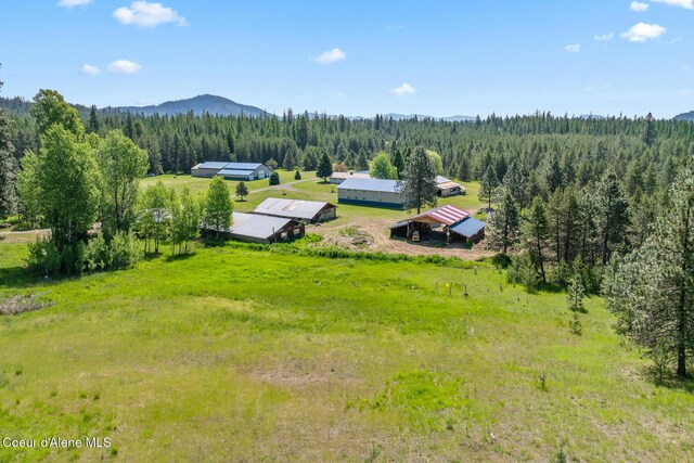 26277 N Chevrolane Way, Rathdrum, ID 83858 - view from above of property featuring a forest and a mountainous background