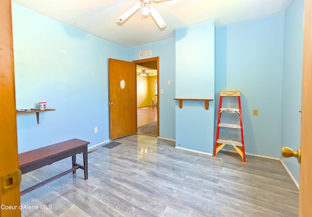 464 E Lincoln, Priest River, ID 83856 - spare room with a ceiling fan, wood finished floors, and baseboards