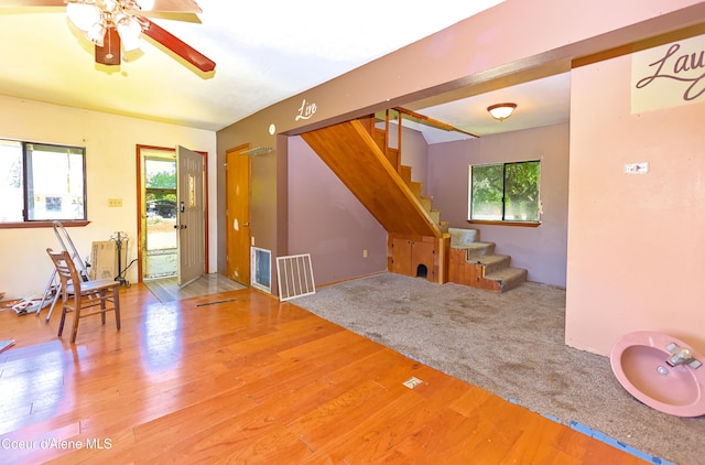 464 E Lincoln, Priest River, ID 83856 - foyer entrance with stairway, a ceiling fan, and wood finished floors