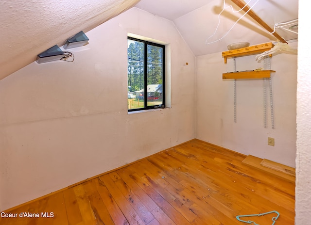 464 E Lincoln, Priest River, ID 83856 - bonus room featuring hardwood / wood-style floors and vaulted ceiling