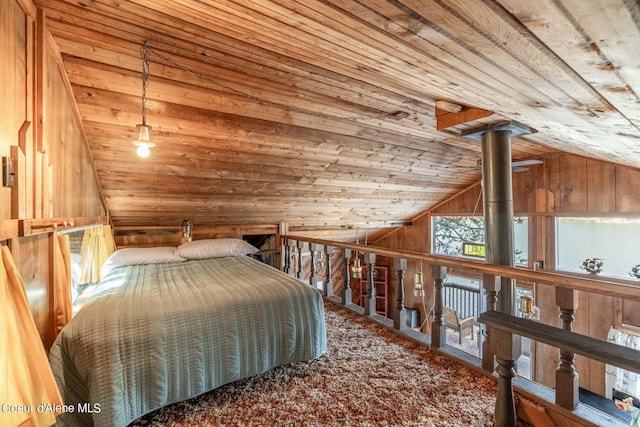 7771 W Channel Ln, Rathdrum, ID 83858 - bedroom featuring vaulted ceiling, wooden ceiling, and wood walls