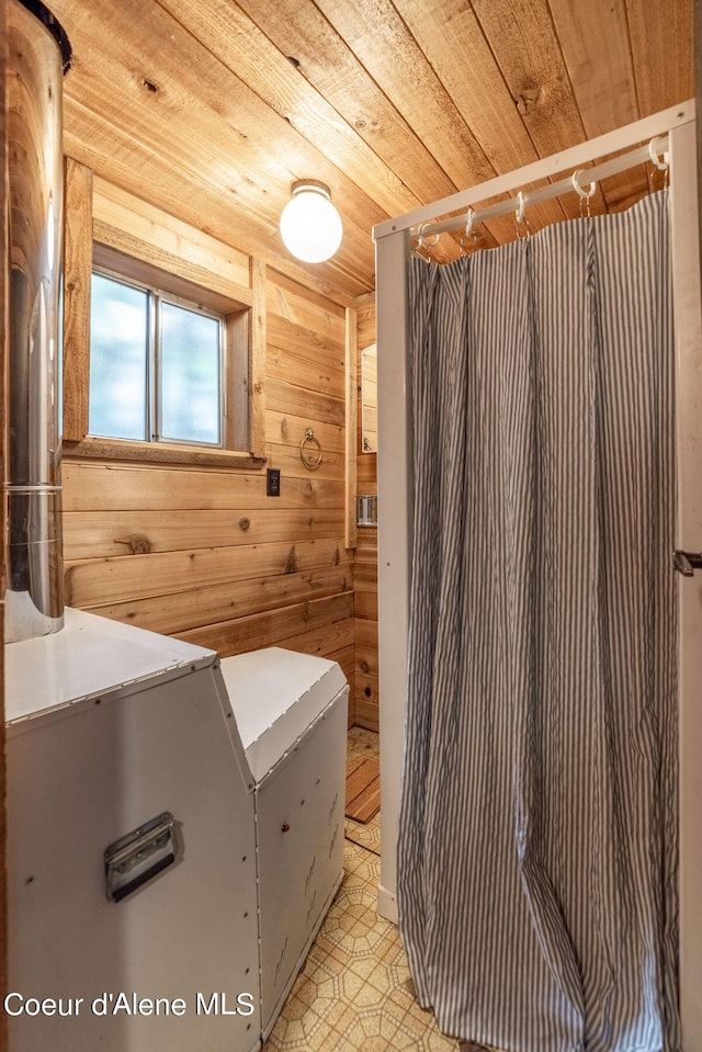 7771 W Channel Ln, Rathdrum, ID 83858 - bathroom featuring wood ceiling and wood walls