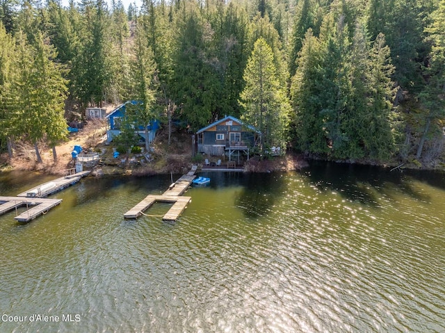 7771 W Channel Ln, Rathdrum, ID 83858 - dock area with a view of trees and a deck with water view