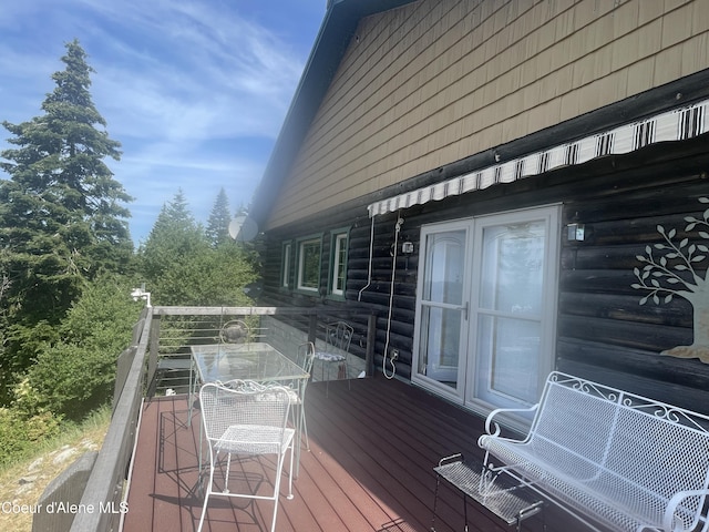 21160 N Corbin Hill Rd, Hayden, ID 83835 - wooden deck with outdoor dining area
