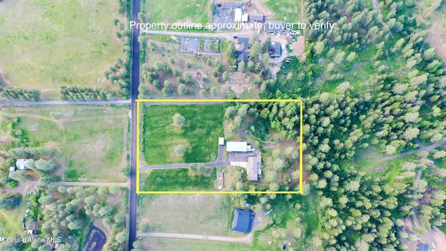 7672 W Carnie Rd, Coeur Dalene, ID 83814 - aerial view of property and surrounding area with property boundaries highlighted