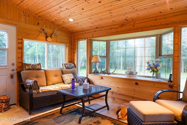 7672 W Carnie Rd, Coeur Dalene, ID 83814 - living area with wooden walls, light tile patterned floors, and wood ceiling