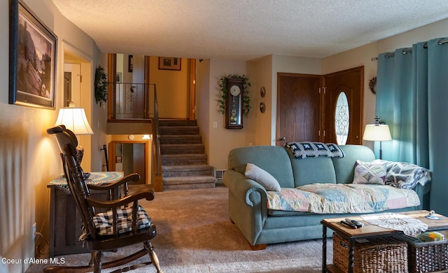 7672 W Carnie Rd, Coeur Dalene, ID 83814 - carpeted living area featuring a textured ceiling and stairway