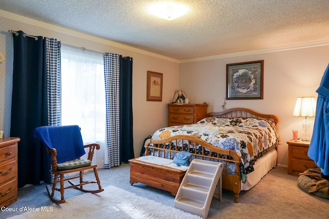 7672 W Carnie Rd, Coeur Dalene, ID 83814 - bedroom featuring ornamental molding, a textured ceiling, and carpet floors