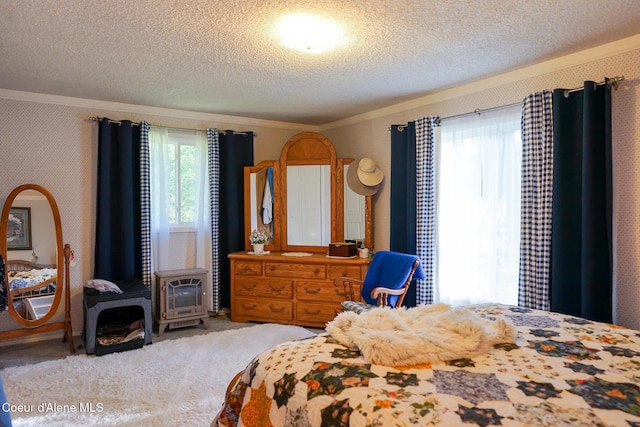 7672 W Carnie Rd, Coeur Dalene, ID 83814 - bedroom featuring a textured ceiling, a wood stove, carpet floors, and crown molding