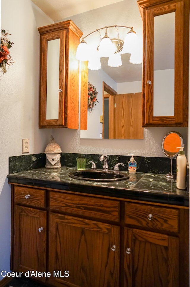7672 W Carnie Rd, Coeur Dalene, ID 83814 - bathroom with vanity