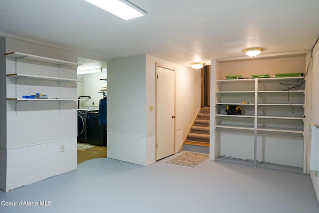 7672 W Carnie Rd, Coeur Dalene, ID 83814 - finished below grade area featuring washing machine and clothes dryer and stairs