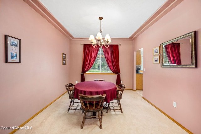 23216 E Morris Rd, Newman Lake, WA 99025 - dining room featuring a chandelier, baseboards, light carpet, and crown molding