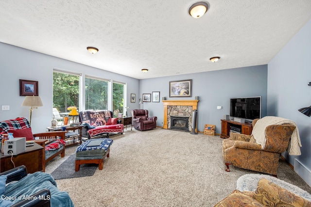 23216 E Morris Rd, Newman Lake, WA 99025 - living room with carpet flooring, a stone fireplace, and a textured ceiling