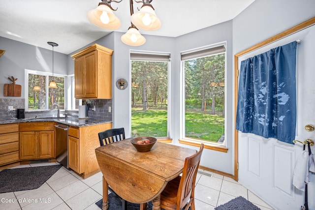 23216 E Morris Rd, Newman Lake, WA 99025 - dining room with light tile patterned flooring, plenty of natural light, and baseboards