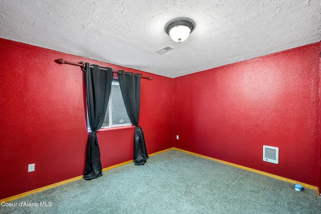 23216 E Morris Rd, Newman Lake, WA 99025 - carpeted empty room featuring a textured ceiling, baseboards, and heating unit