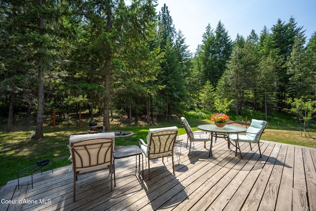 23216 E Morris Rd, Newman Lake, WA 99025 - wooden terrace featuring an outdoor fire pit, a yard, and outdoor dining area