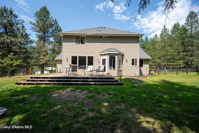 23216 E Morris Rd, Newman Lake, WA 99025 - rear view of house with a lawn and a deck