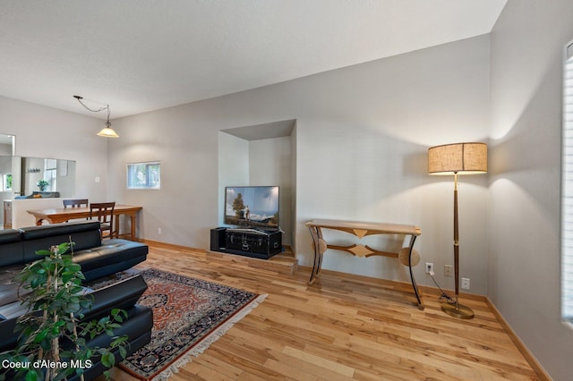 927 E Birch Ave, Coeur Dalene, ID 83814 - living area with light wood-type flooring and baseboards