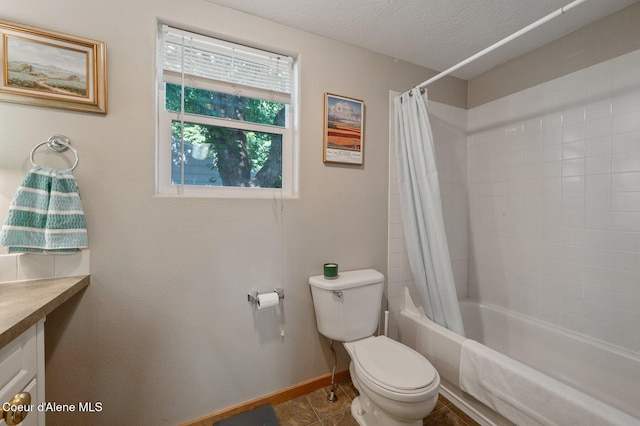 927 E Birch Ave, Coeur Dalene, ID 83814 - bathroom featuring shower / tub combo with curtain, vanity, tile patterned flooring, and a textured ceiling