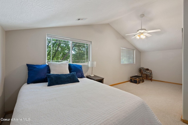 927 E Birch Ave, Coeur Dalene, ID 83814 - carpeted bedroom with vaulted ceiling and ceiling fan
