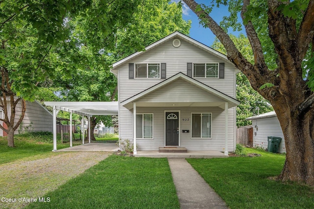 927 E Birch Ave, Coeur Dalene, ID 83814 - traditional-style house with driveway, a porch, and a carport
