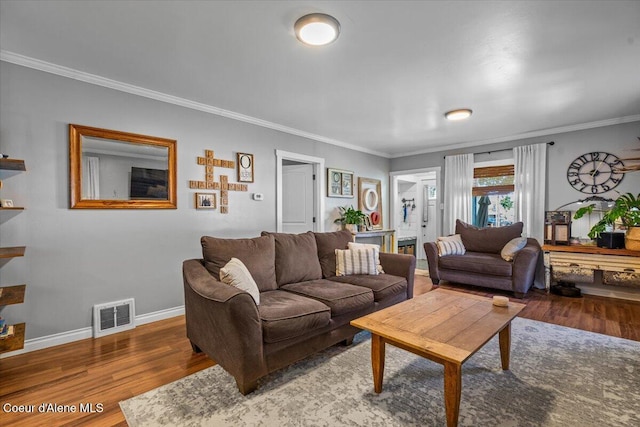 115 Fifth St, Osburn, ID 83849 - living area with wood finished floors, ornamental molding, and baseboards