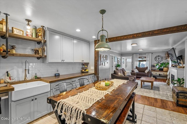 115 Fifth St, Osburn, ID 83849 - dining room with ornamental molding, recessed lighting, and light tile patterned flooring