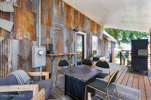 115 Fifth St, Osburn, ID 83849 - wooden deck featuring outdoor dining area