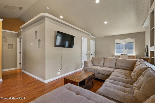 115 Fifth St, Osburn, ID 83849 - living area featuring wood finished floors, baseboards, recessed lighting, and vaulted ceiling