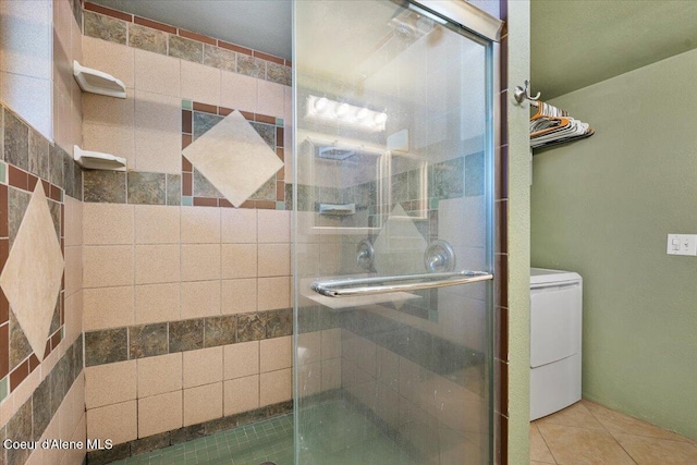 115 Fifth St, Osburn, ID 83849 - full bathroom featuring a stall shower, tile patterned flooring, and toilet