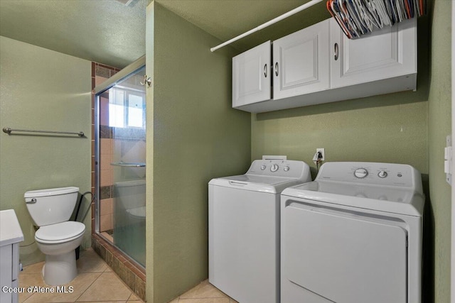 115 Fifth St, Osburn, ID 83849 - laundry room featuring washer and dryer and light tile patterned flooring