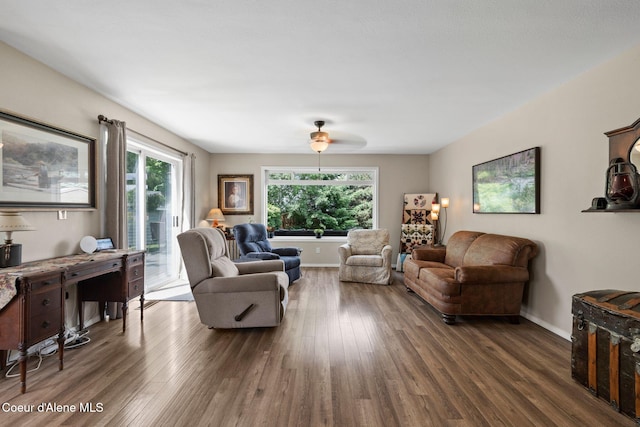 67 Spur Dr, Sandpoint, ID 83864 - living room with healthy amount of natural light, wood finished floors, and a ceiling fan