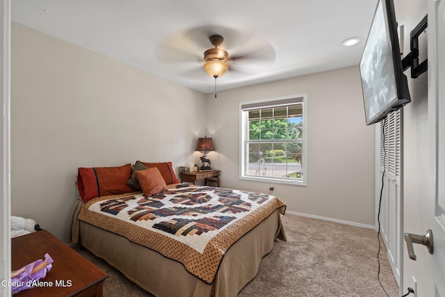 67 Spur Dr, Sandpoint, ID 83864 - bedroom with light colored carpet and ceiling fan