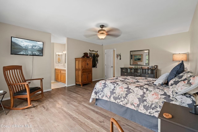 67 Spur Dr, Sandpoint, ID 83864 - bedroom with light wood-style flooring and ensuite bathroom