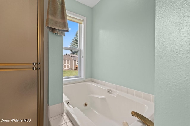 67 Spur Dr, Sandpoint, ID 83864 - bathroom with a whirlpool tub and tile patterned floors