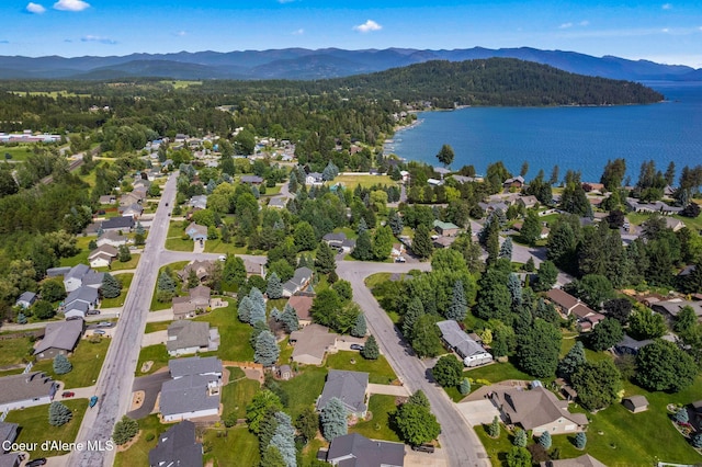 67 Spur Dr, Sandpoint, ID 83864 - aerial view of a water and mountain view and a heavily wooded area