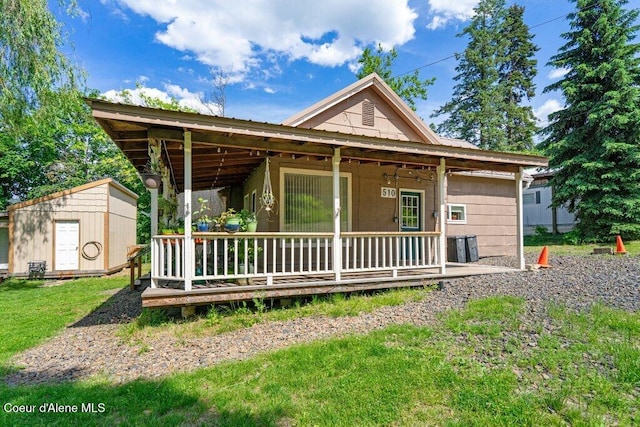 510 S 2nd St, Saint Maries, ID 83861 - view of front of house featuring a shed and a front lawn