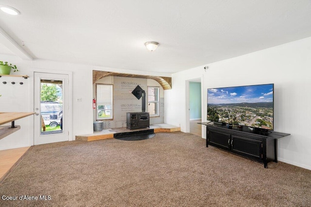 510 S 2nd St, Saint Maries, ID 83861 - living area with a wood stove and carpet flooring